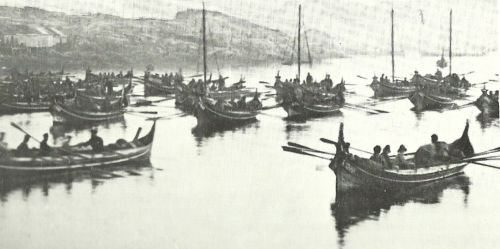 Fiskere pÃ¥ Lofoten ror ud til fiskepladserne i de traditionelle nordlandsbÃ¥de