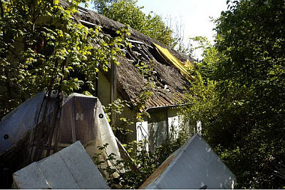 A ramschaccle house in the backyard of Denmark