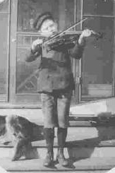 A boy plays the violin