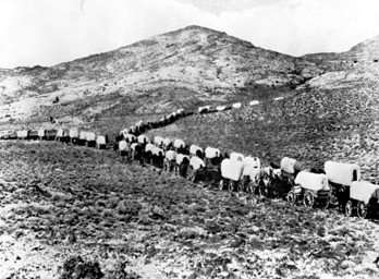 A wagon train of American settlers at Santa Fe