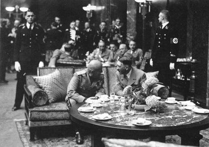 Hitler and Mussolini in eager conversation