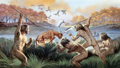 A group of prehistoric people chases a deer